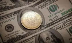 Отново спад: Bitcoin се връща под прага от $57 000 